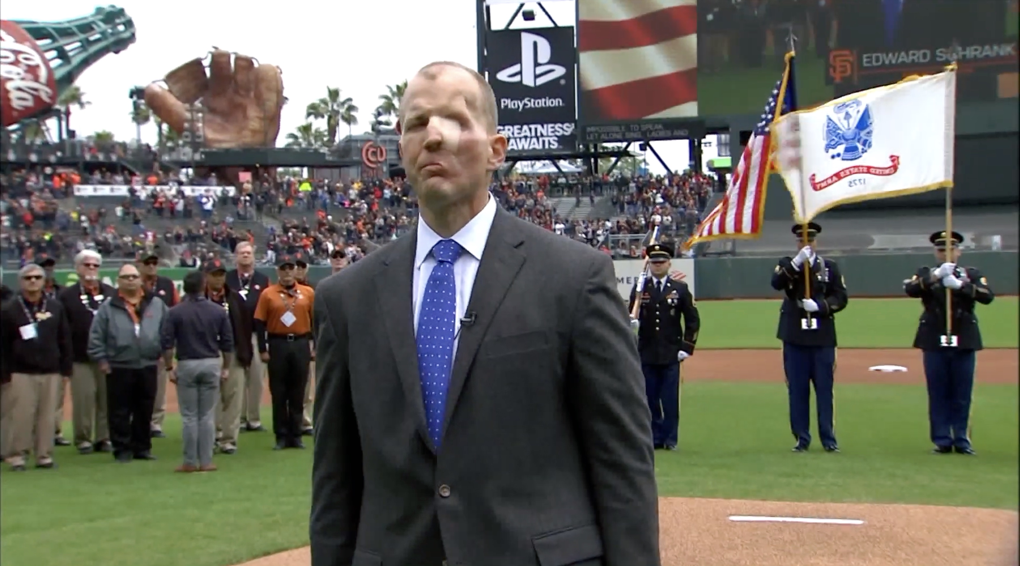 Edward Schrank standing for the National Anthem